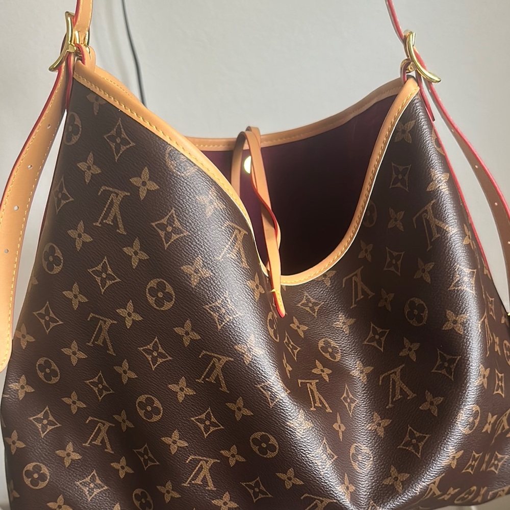 Louis Vuitton Brown and Orange Hobo Bag with Iconic Monogram